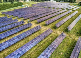Aerial perspective of a solar farm in Kellogg, Minnesota, showcasing renewable energy technology.